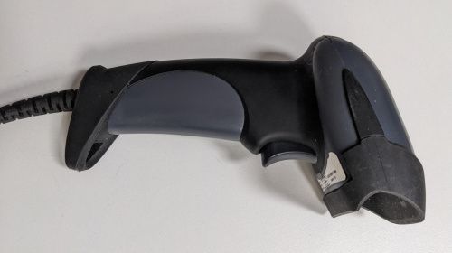 La douchette Eyoyo EY-001 vue de côté, avec sa gâchette et son câble USB enroulé.